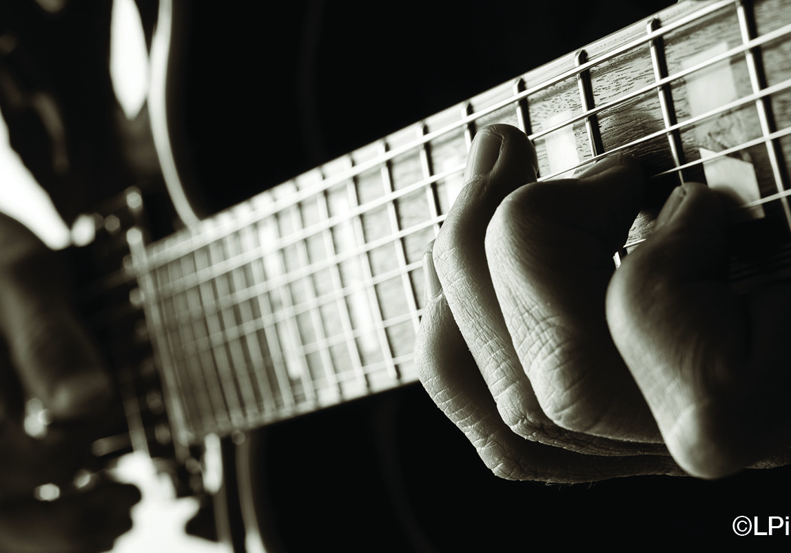 Playing Jazz Guitar playing scales on a jazz electric guitar